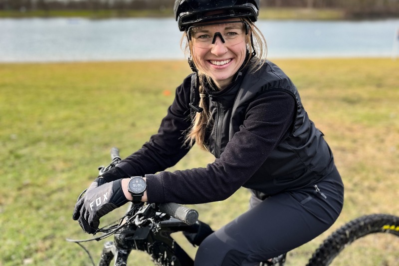Woman with helmet on bike 