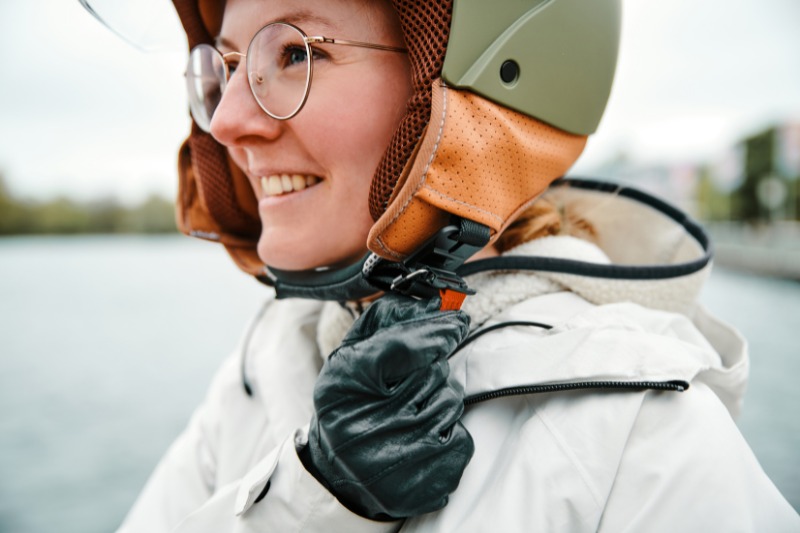 Woman with vespa helmet
