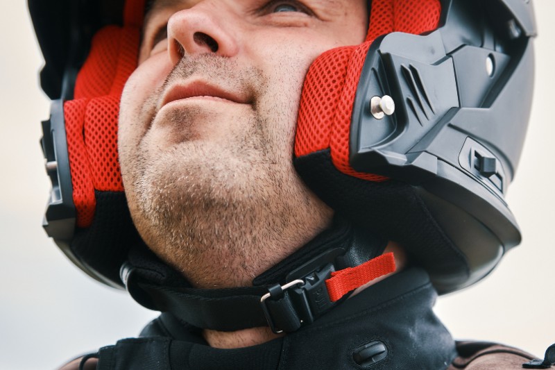 Man with motorcycle helmet