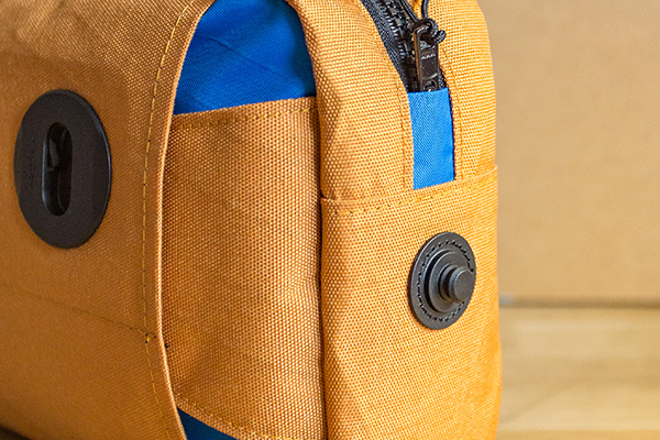 Close up of the bike bag with fidlock fasteners 