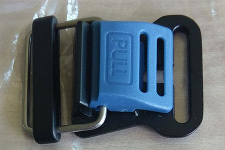 Close-up of fake HOOK buckle - colours black and blue - closed