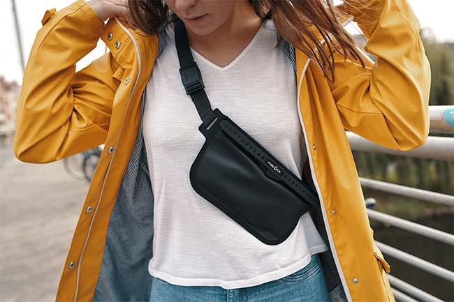 Sling bag protecting essentials from rainy weather