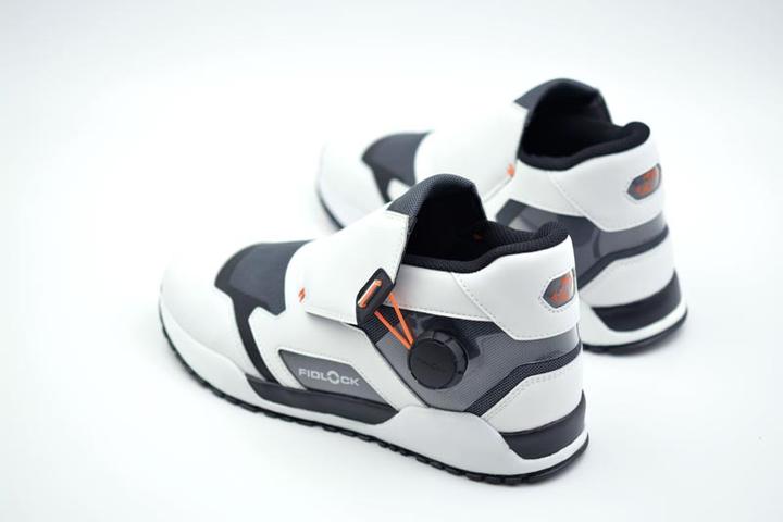 A pair of the FIDLOCK concept sneaker shown from behind in a perspective view